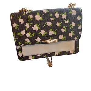 Michael Kors Jade large gusset shoulder bag in a floral-printed logo canvas